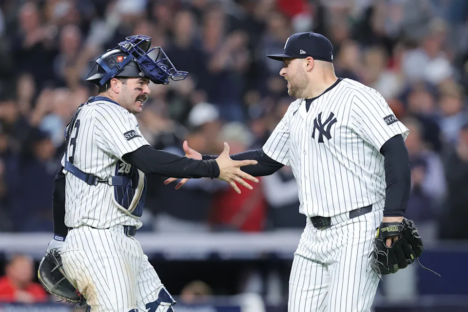 Oct 1, 2025; Bronx, New York, USA; New York Yankees relief pitcher David Bednar (53) celebrates with New York Yankees catcher Austin Wells (28) after the game against the Boston Red Sox during game two of the Wildcard round for the 2025 MLB playoffs at Yankee Stadium. Mandatory Credit: Brad Penner-Imagn Images