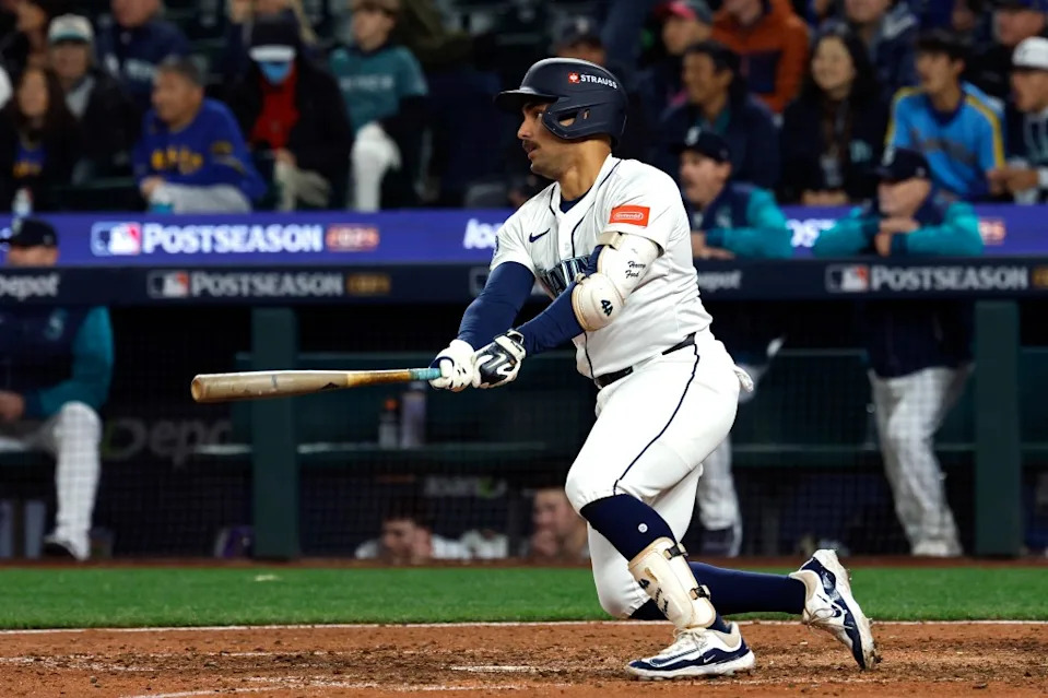 Harry Ford of the Seattle Mariners hits a single during the ninth inning against the Toronto Blue Jays in Game 3 of the American League Championship Series at T-Mobile Park on October 15, 2025 in Seattle, Washington. Getty Images
