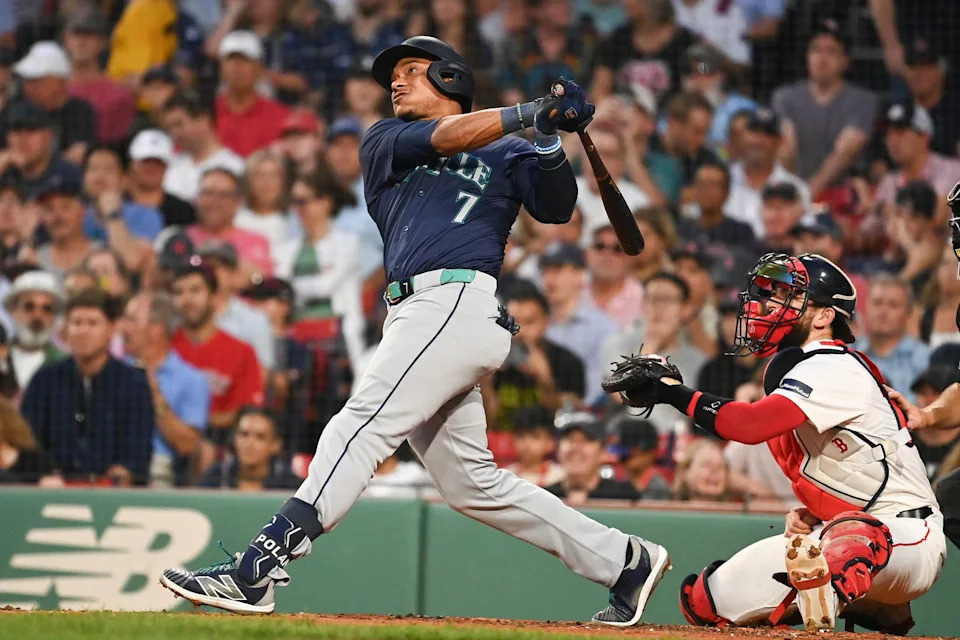 Jul 30, 2024; Boston, Massachusetts, USA; Seattle Mariners second baseman Jorge Polanco (7) hits a home run against the Boston Red Sox during the fourth inning at Fenway Park. (Eric Canha/Imagn Images)