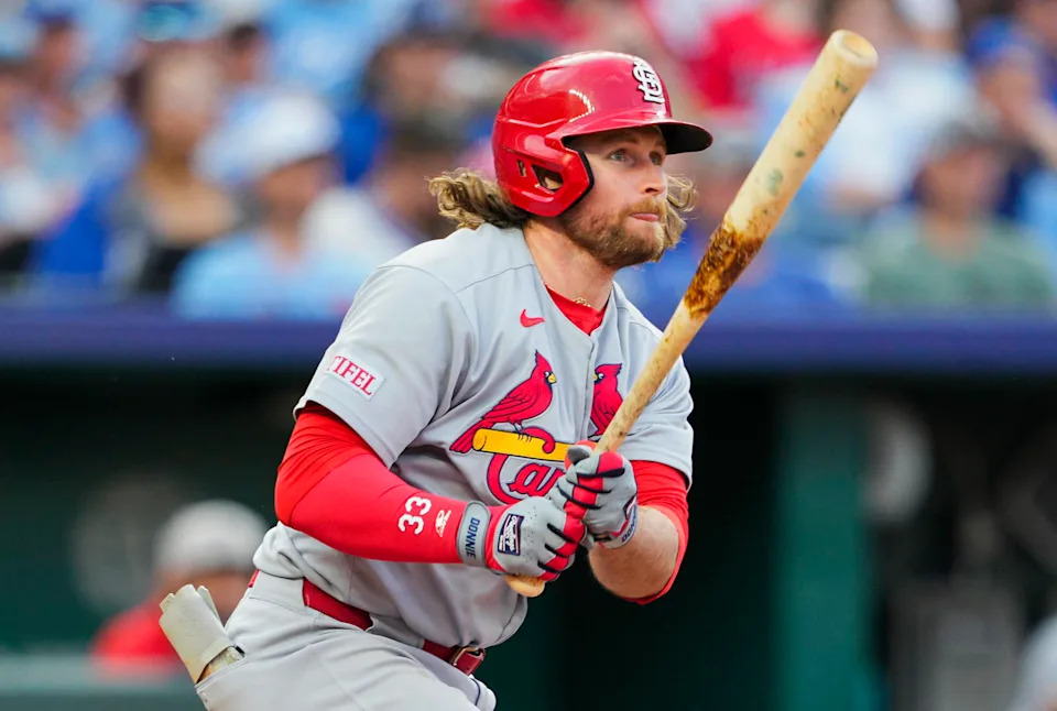 May 16, 2025; Kansas City, Missouri, USA; St. Louis Cardinals second baseman Brendan Donovan (33) hits a double during the fourth inning against the Kansas City Royals at Kauffman Stadium. Mandatory Credit: Jay Biggerstaff-Imagn Images