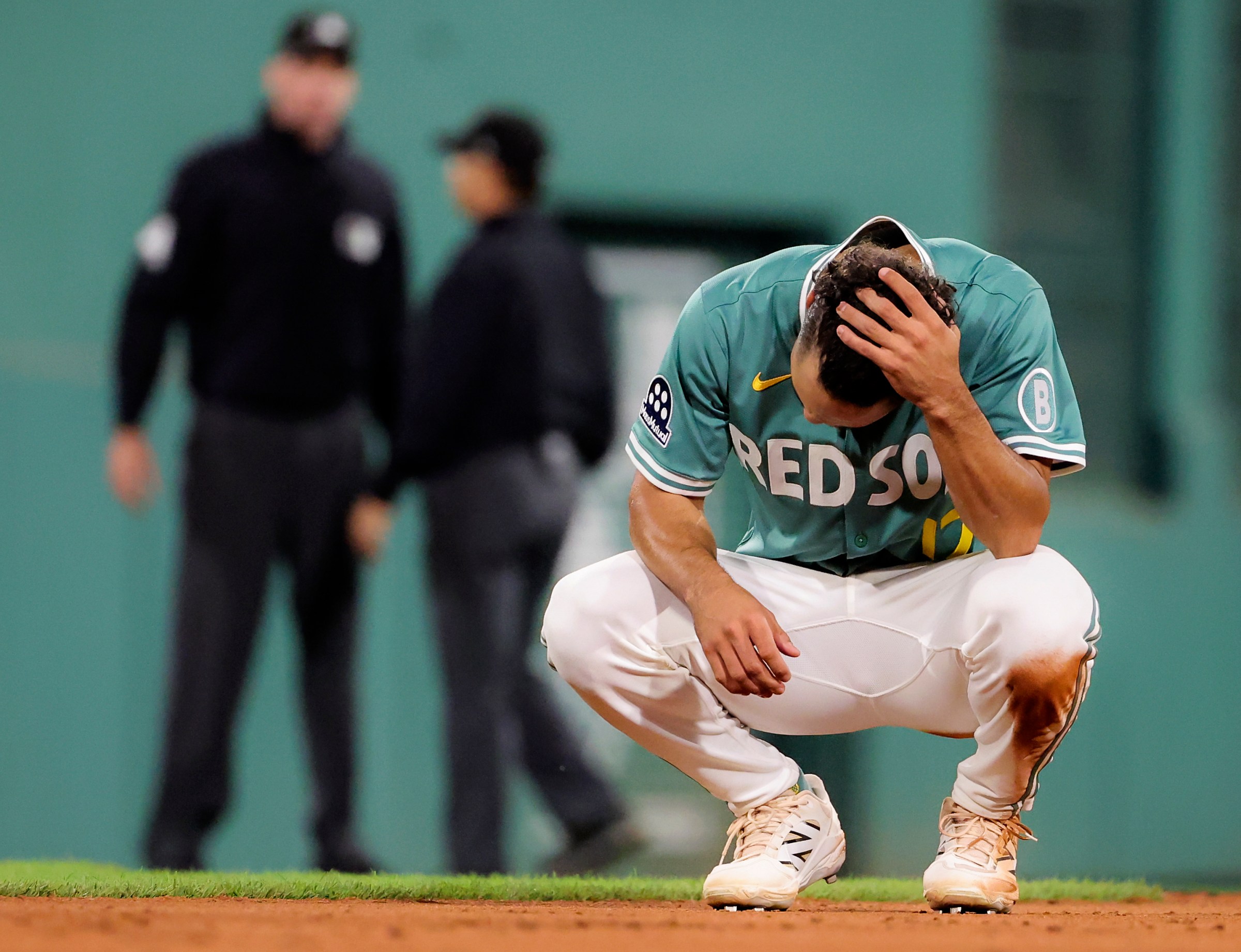 Boston, MA - June 27: Boston Red Sox second baseman David Hamilton holds his head in his hands after the end of the eighth inning on June 27, 2025. (Photo by Matthew J. Lee/The Boston Globe via Getty Images)
