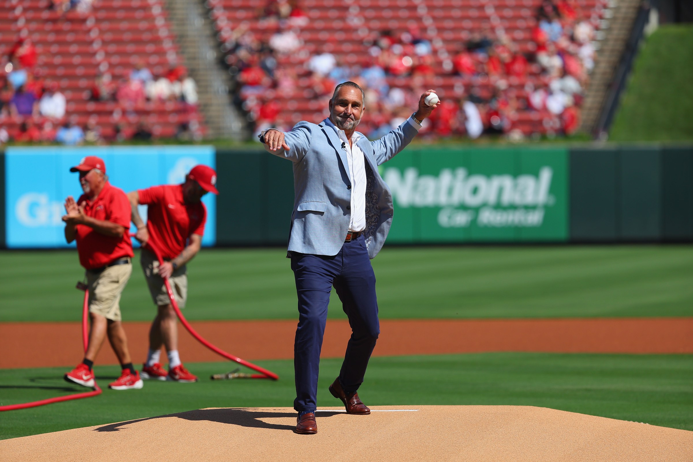 ST LOUIS, MISSOURI - SEPTEMBER 21: John Mozeliak, President of Baseball Operations for the St. Louis Cardinals throws out the first pitch prior to a game between the St. Louis Cardinals and the Milwaukee Brewers at Busch Stadium on September 21, 2025 in St Louis, Missouri. (Photo by Dilip Vishwanat/Getty Images)