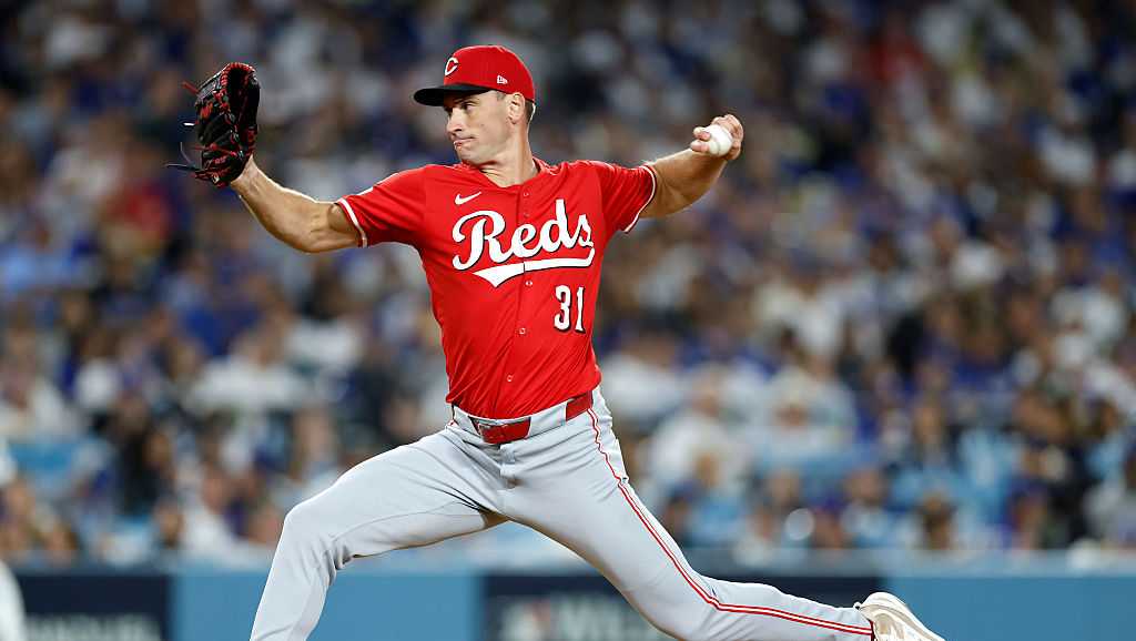 Cincinnati native Brent Suter assisting The Help Squad with holiday toy drive