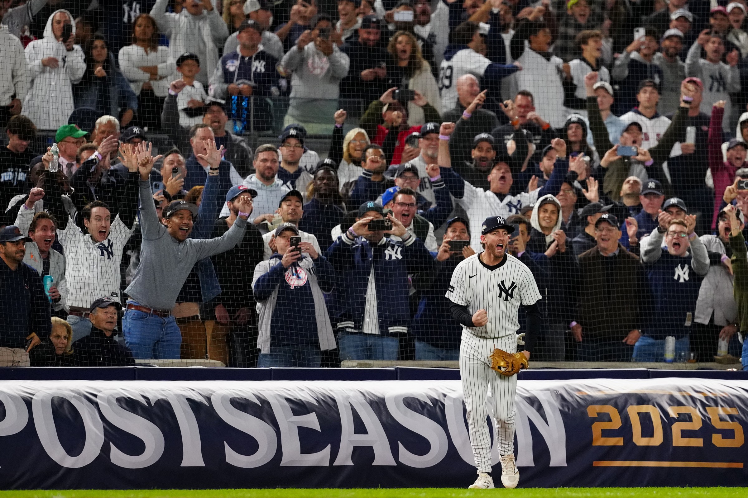 NEW YORK, NY - OCTOBER 02: Ryan McMahon #19 of the New York Yankees reacts after making a catch for the final out of the game to win Game Three of the American League Wild Card Series between the Boston Red Sox and the New York Yankees at Yankee Stadium on Thursday, October 2, 2025 in New York, New York. (Photo by Daniel Shirey/MLB Photos via Getty Images)