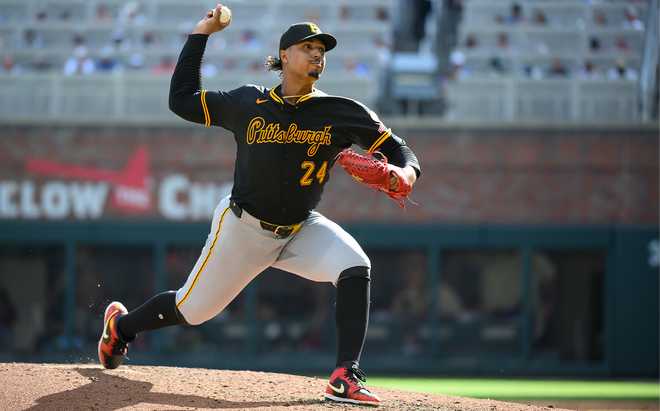 Johan Oviedo of the Pittsburgh Pirates pitches in the fifth inning of a game against the Atlanta Braves at Truist Park on September 28, 2025 in Atlanta, Georgia.
