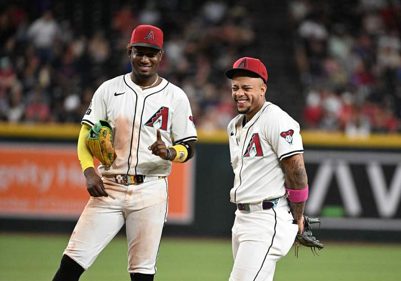 Arizona Diamondbacks infielders Geraldo Perdomo and Ketel Marte celebrate a win over the Cleveland Guardians at Chase Field.