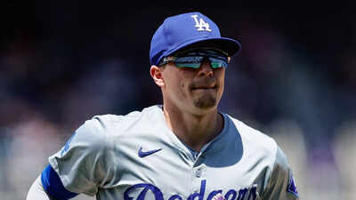 Los Angeles Dodgers' star Kike Hernandez takes on a festive role in a surprise Christmas visit