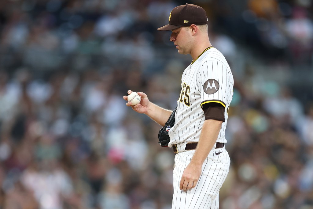 Michael King #34 of the San Diego Padres looks on prior to being taken out of the game during the third inning of a game against the Arizona Diamondbacks at Petco Park on September 27, 2025.