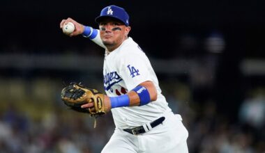 Los Angeles Dodgers shortstop Miguel Rojas throws to first for the out on a grounder by Milwaukee Brewers' Christian Yelich during the sixth inning of a baseball game Tuesday, Aug. 15, 2023, in Los Angeles. (AP Photo/Ryan Sun)