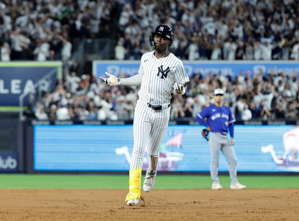 Jazz Chisholm Jr. rounds the bases after hitting a solo home run against the Toronto Blue Jays.