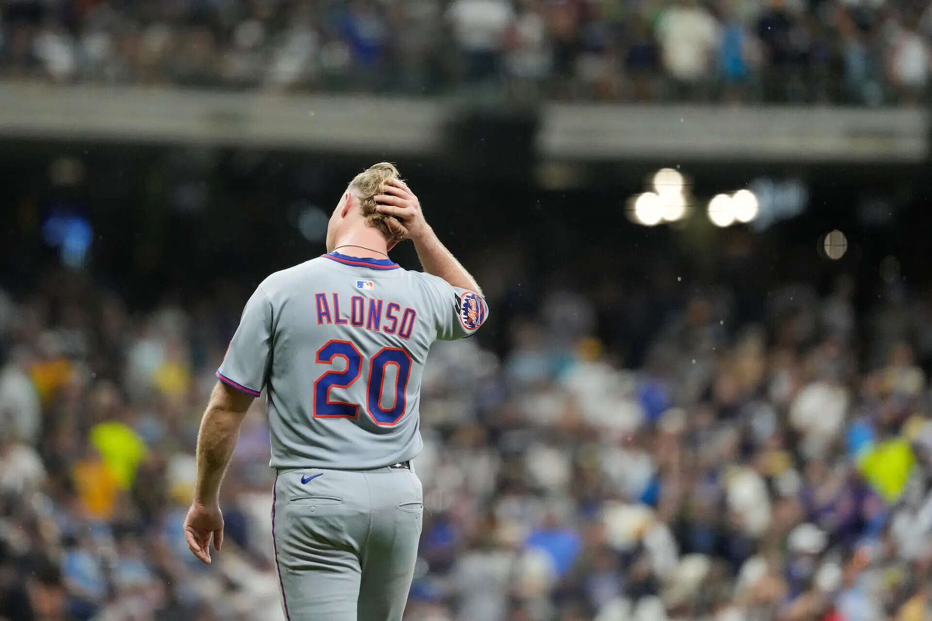 FILE - New York Mets' Pete Alonso reacts during a baseball game against the Milwaukee Brewers, Saturday, Aug. 9, 2025, in Milwaukee. (AP Photo/Aaron Gash, File) Orioles agree to $155 million, 5-year deal with slugger Pete Alonso, AP source says