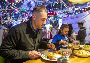 George Springer and Delfina Budziak enjoy lunch at Jack Astor's in downtown Toronto on Dec. 3, 2025.