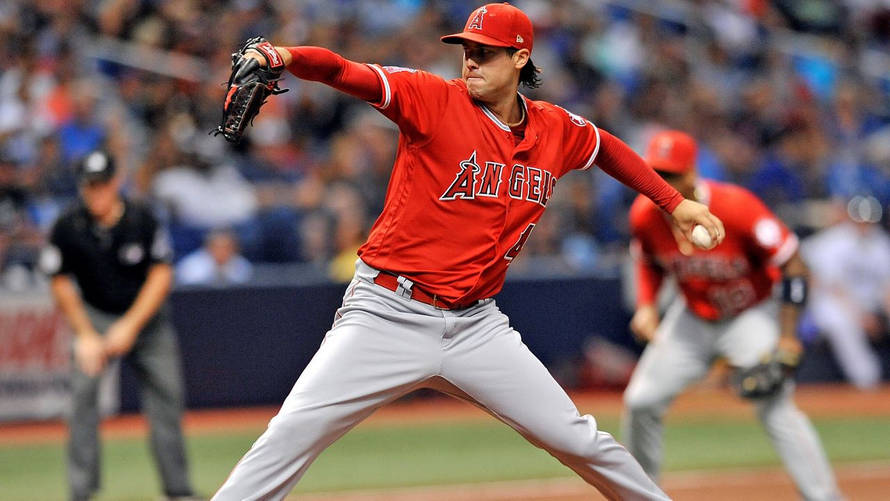 Los Angeles Angels starter Tyler Skaggs pitches to a Tampa Bay Rays batter during the first inning of a baseball game on July 31, 2018, in St. Petersburg, Fla. (AP Photo/Steve Nesius)