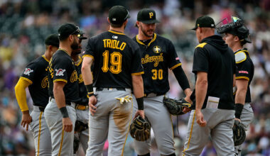 MLB: Pirates at Rockies — Paul Skenes and Don Kelly meet at the mound.