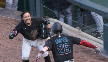 Garrett Coopers late home run backs up pitching, helps Marlins advance past Cubs and into NLDS