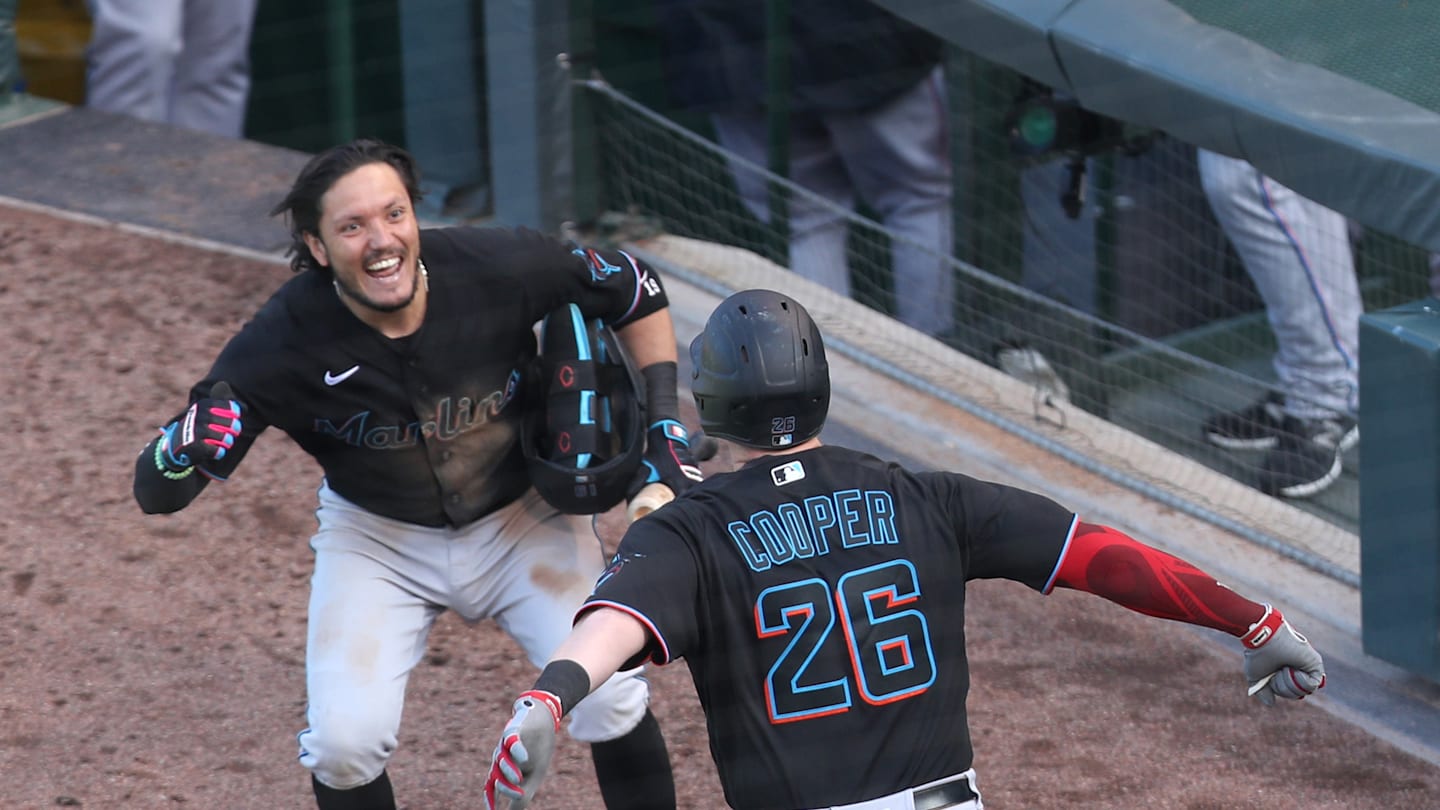 Garrett Coopers late home run backs up pitching, helps Marlins advance past Cubs and into NLDS