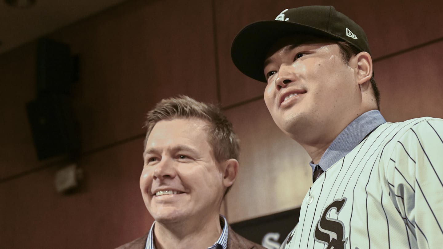 Dec 22, 2025; Chicago, Il, USA;  New Chicago White Sox player Munetaka Murakami, right, dons his hat with General Manager Chris Getz, left,  during a press conference  where he was introduced at Rate Field. Mandatory Credit: Matt Marton-Imagn Images