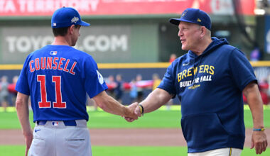Oct 4, 2025; Milwaukee, Wisconsin, USA; Chicago Cubs manager Craig Counsell (11) shakes hands with Milwaukee Brewers manager Pat Murphy (49) before game one of the NLDS round for the 2025 MLB playoffs between the Chicago Cubs and Milwaukee Brewers at American Family Field. Mandatory Credit: Benny Sieu-Imagn Images