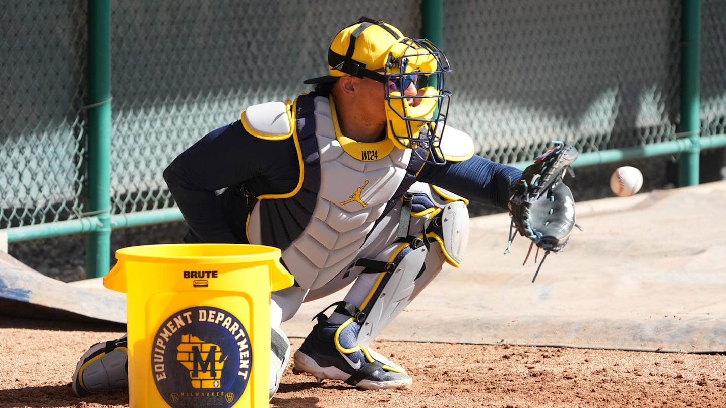 Feb 14, 2025; Phoenix, AZ, USA; Milwaukee Brewers catcher William Contreras (24) works out in the bullpen during spring training camp. Mandatory Credit: Rick Scuteri-Imagn Images
