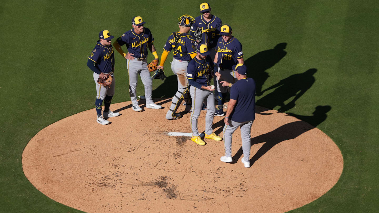 Oct 16, 2025; Los Angeles, California, USA; Milwaukee Brewers pitcher Aaron Ashby (26) is removed by manager Pat Murphy in the first inning against the Los Angeles Dodgers during game three of the NLCS round for the 2025 MLB playoffs at Dodger Stadium. Mandatory Credit: Kirby Lee-Imagn Images