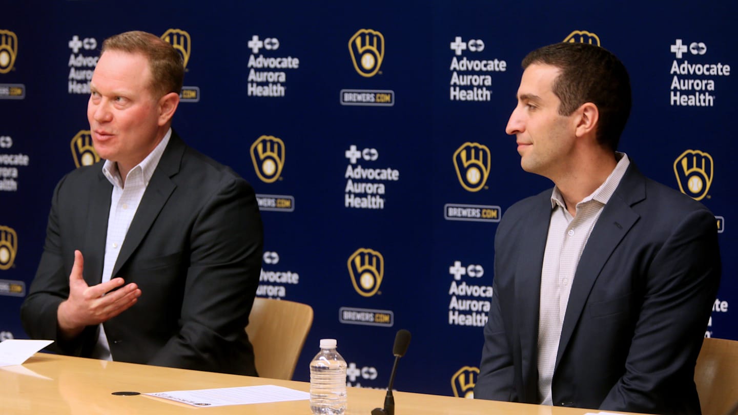 Matt Arnold, left, speaks at press conference where it was announced that he would be taking over the role as president of baseball operations for the Milwaukee Brewers, October 27, 2022. David Stearns, who joined the organization in October 2015 as general manager and was named president of baseball operations prior to the 2019 season, said he would be stepping down.