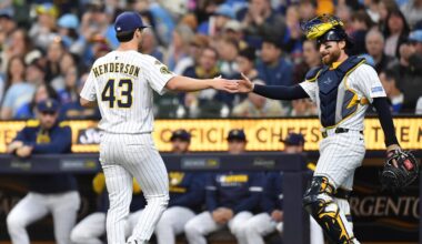 Apr 20, 2025; Milwaukee, Wisconsin, USA; Milwaukee Brewers starting pitcher Logan Henderson (43) celebrates with catcher Eric Haase (13) after ending the top of the first inning against the Athletics in his MLB debut at American Family Field. Mandatory Credit: Patrick Gorski-Imagn Images