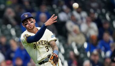 Minnesota Twins right fielder Manuel Margot (13) bunts a groundout to Milwaukee Brewers third baseman Joey Ortiz (3) who throws to Milwaukee Brewers first baseman Rhys Hoskins (12) during the fourth inning of the game on Wednesday April 3, 2024 at American Family Field in Milwaukee, Wis.