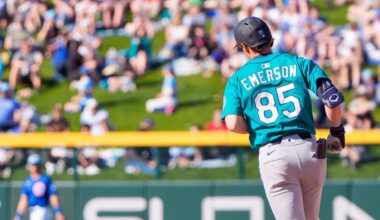 Mar 8, 2025; Mesa, Arizona, USA; Seattle Mariners infielder Colt Emerson (85) hits a home run in the top of the ninth during a spring training game against the Chicago Cubs at Sloan Park. Mandatory Credit: Allan Henry-Imagn Images