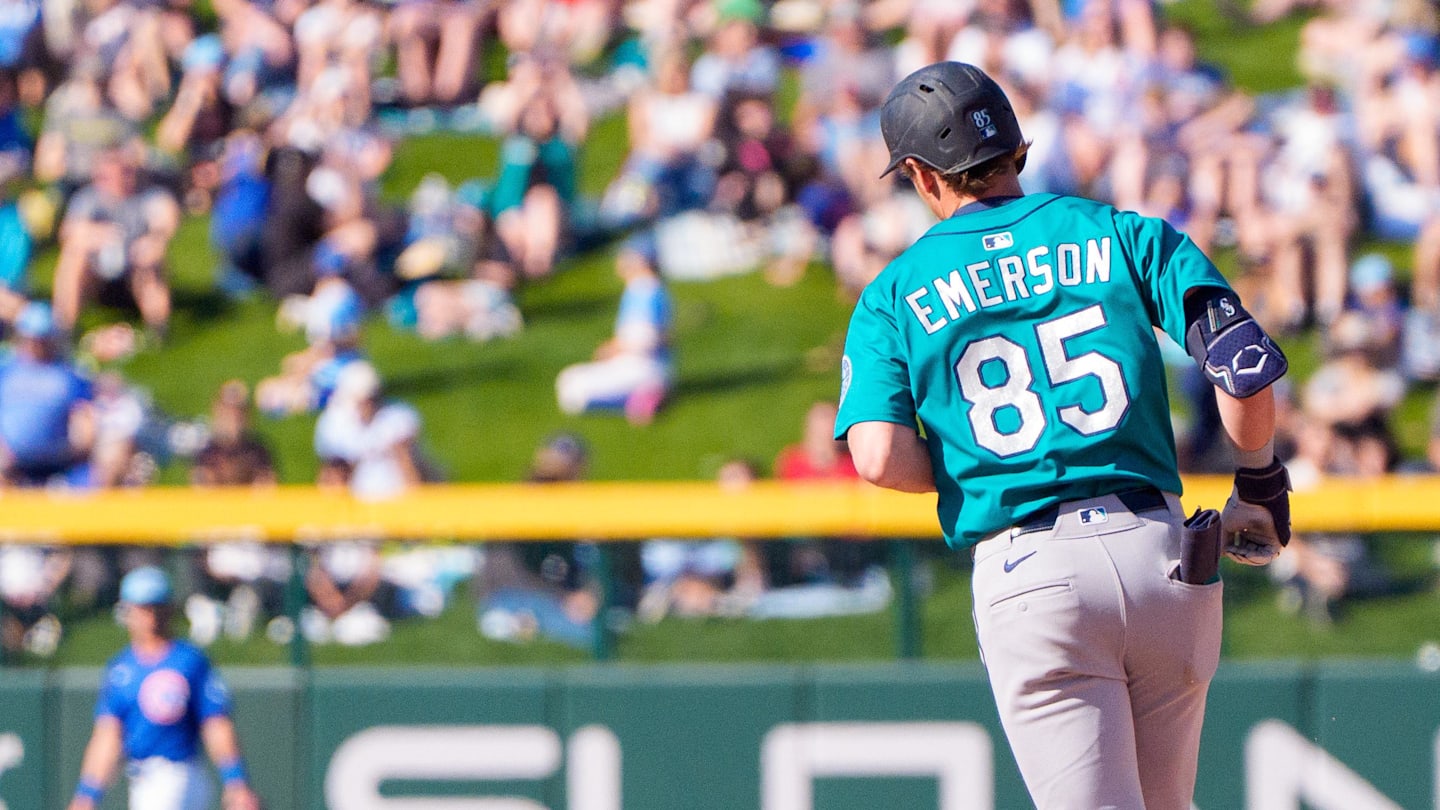 Mar 8, 2025; Mesa, Arizona, USA; Seattle Mariners infielder Colt Emerson (85) hits a home run in the top of the ninth during a spring training game against the Chicago Cubs at Sloan Park. Mandatory Credit: Allan Henry-Imagn Images