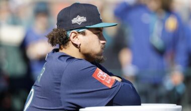 Oct 8, 2025; Detroit, Michigan, USA; Seattle Mariners first baseman Josh Naylor (12) stands in the dugout prior to game four of the ALDS round for the 2025 MLB playoffs against the Detroit Tigers at Comerica Park. Mandatory Credit: Rick Osentoski-Imagn Images