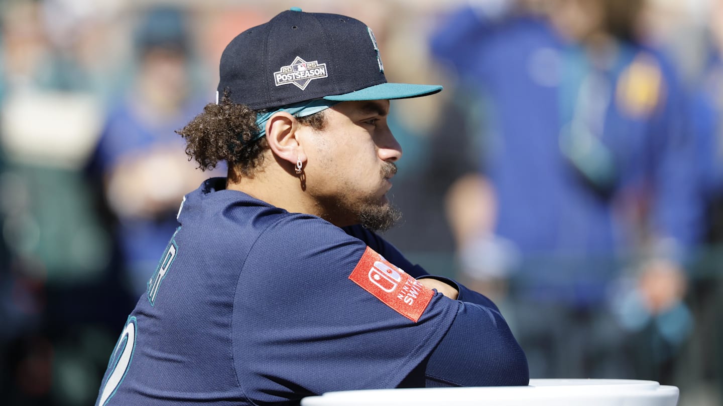Oct 8, 2025; Detroit, Michigan, USA; Seattle Mariners first baseman Josh Naylor (12) stands in the dugout prior to game four of the ALDS round for the 2025 MLB playoffs against the Detroit Tigers at Comerica Park. Mandatory Credit: Rick Osentoski-Imagn Images