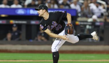 Jun 13, 2023; New York City, New York, USA; New York Mets relief pitcher David Robertson (30) delivers a pitch  during the ninth inning against the New York Yankees at Citi Field. Mandatory Credit: Vincent Carchietta-Imagn Images