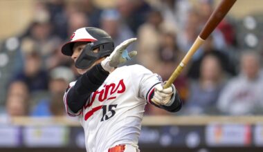Sep 3, 2025; Minneapolis, Minnesota, USA; Minnesota Twins second baseman Luke Keaschall (15) hits a RBI double against the Chicago White Sox in the first inning at Target Field. Mandatory Credit: Jesse Johnson-Imagn Images