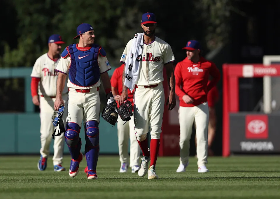 Oct 6, 2024; Philadelphia, Pennsylvania, USA; Philadelphia Phillies pitcher Cristopher Sanchez (61) and catcher J.T. Realmuto (10) walk the field before the game against the New York Mets during game two of the NLDS for the 2024 MLB Playoffs at Citizens Bank Park. Mandatory Credit: Bill Streicher-Imagn Images