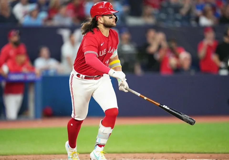 Jul 1, 2023; Toronto, Ontario, CAN; Toronto Blue Jays shortstop Bo Bichette (11) reacts after hitting a double against the Boston Red Sox during the ninth inning at Rogers Centre. Mandatory Credit: Nick Turchiaro-Imagn Images