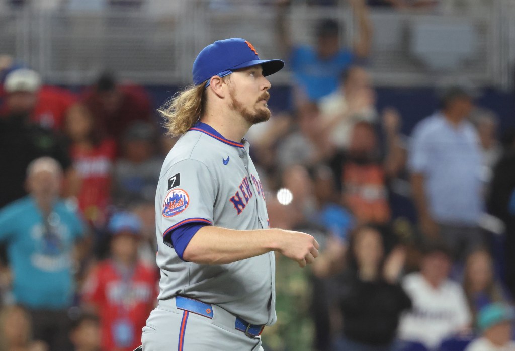 Ryne Stanek #55 of the New York Mets reacts after allowing a run.