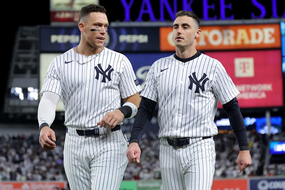 Oct. 1, 2025; Bronx, New York, USA; New York Yankees right fielder Aaron Judge (99) talks to left fielder Cody Bellinger (35) during the playoffs against the Boston Red Sox at Yankee Stadium.