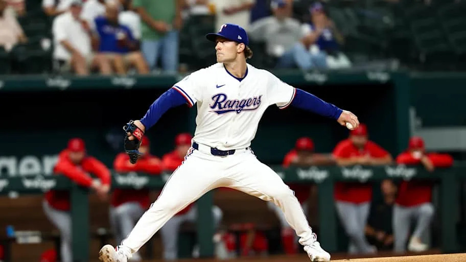 Texas Rangers starting pitcher Jacob Latz throws.