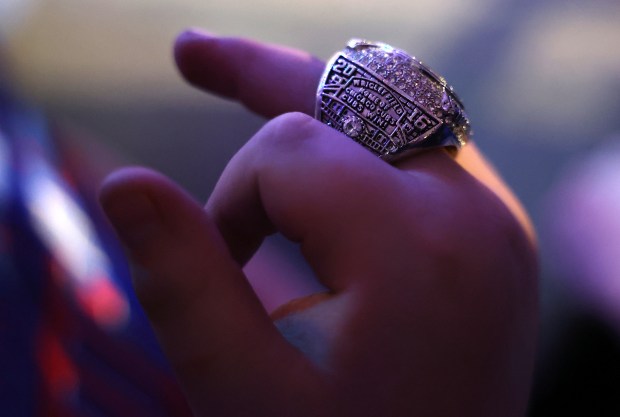 A young fan wears a replica 2016 World Series champion ring while attending day 1 of the Cubs Convention at the Sheraton Grand Chicago on Friday, Jan. 16, 2026. (Chris Sweda/Chicago Tribune)