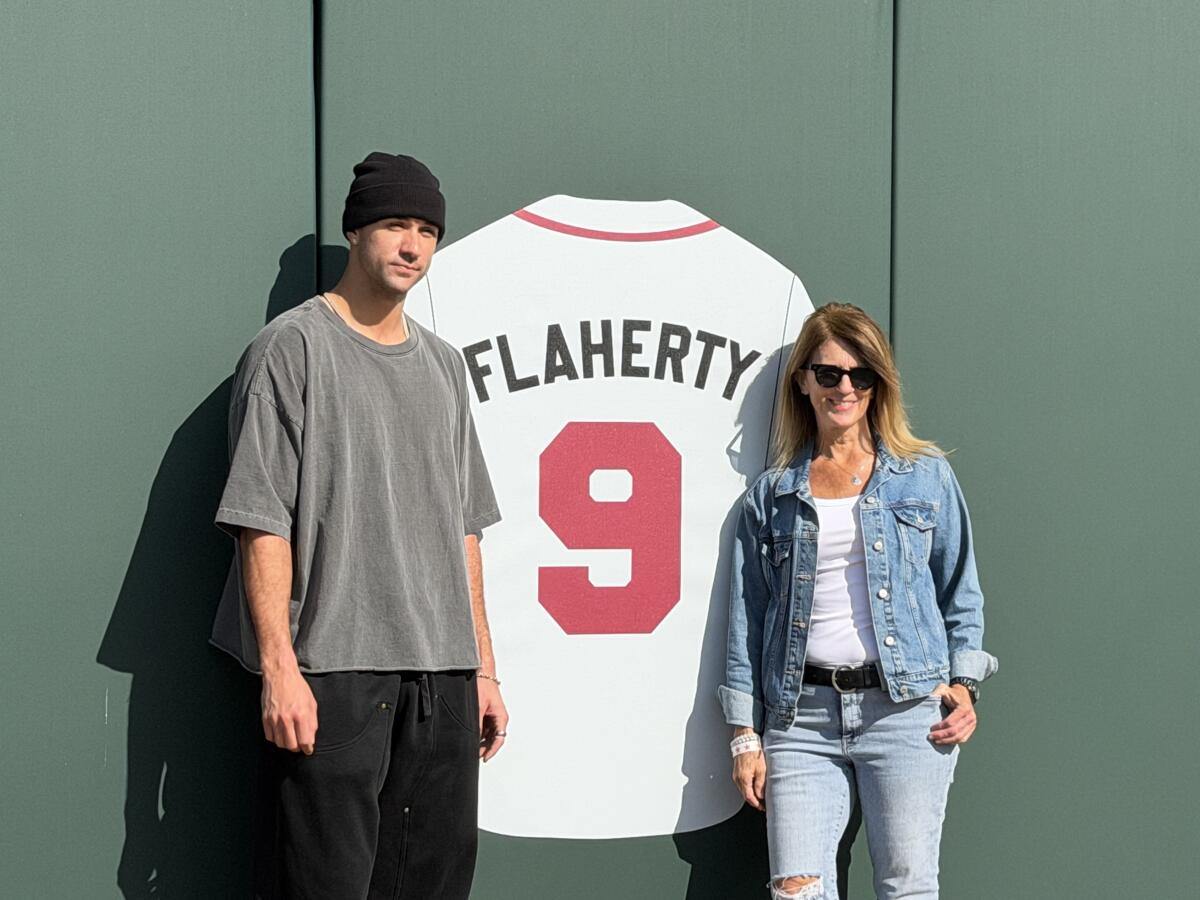 Jack Flaherty with his mother at O'Malley Family Field on Saturday.