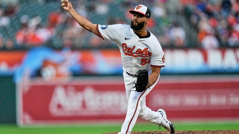 Baltimore Orioles relief pitcher Seranthony Dominguez (56) delivers during the...