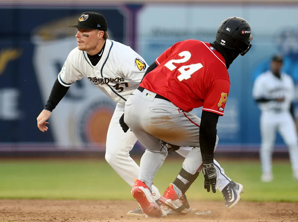 Cleveland Guardians top prospect Travis Bazzana tags out Altoona's Imanol Vargas at second in the third quarter of Akron RubberDucks home opener against Altoona Curve. Tuesday, April 08, 2025.