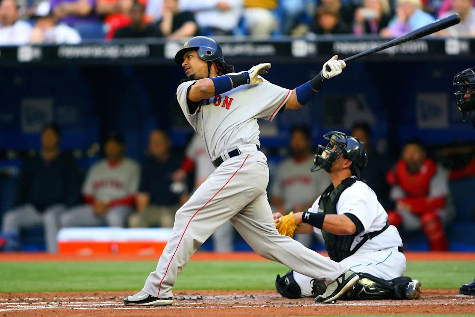 May 9, 2007; Toronto, ON, Canada; Boston Red Sox left fielder (24) Manny Ramirez bats against the Toronto Blue Jays at the Rogers Centre in Toronto, ON. Boston won 9-3. (Tom Szczerbowski/Imagn Images)