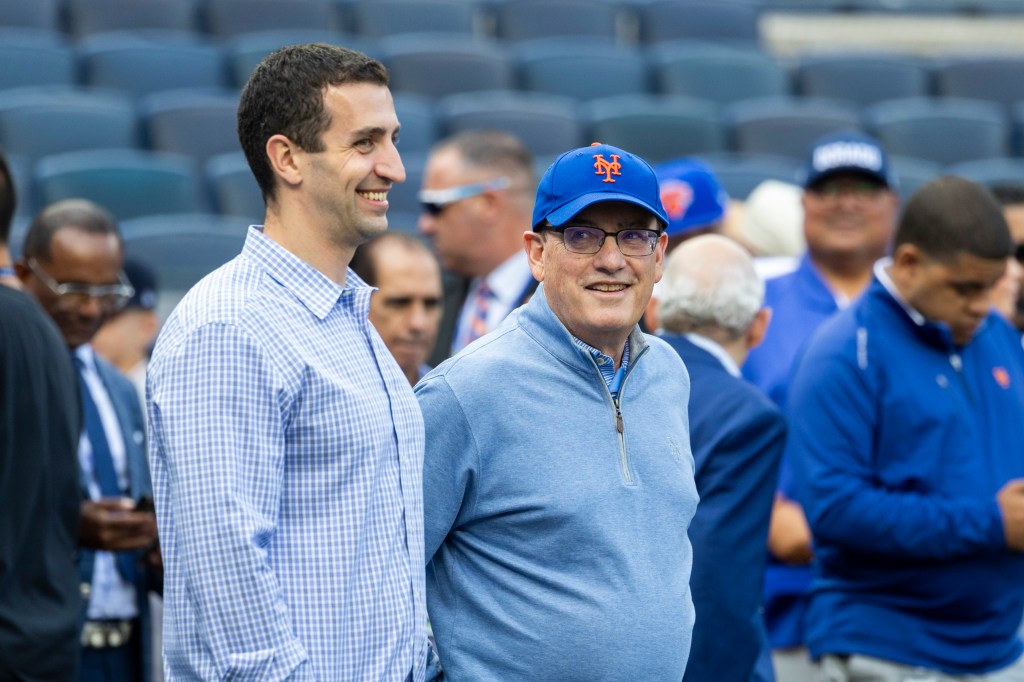 New York Mets president of baseball operations David Stearns stands on the field with owner Steve Cohen before a game against the New York Yankees at Yankee Stadium, Friday, May 16, 2025, in Bronx, NY.