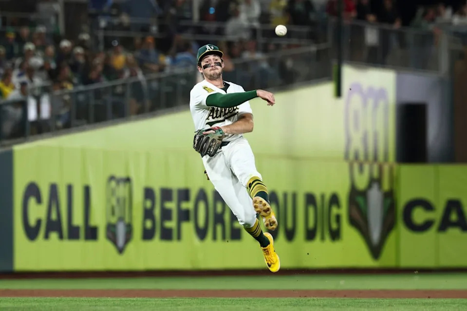 Athletics shortstop Jacob Wilson throws to first base during the seventh inning of a baseball game against the Kansas City Royals in West Sacramento, Calif., Sept. 27, 2025. AP