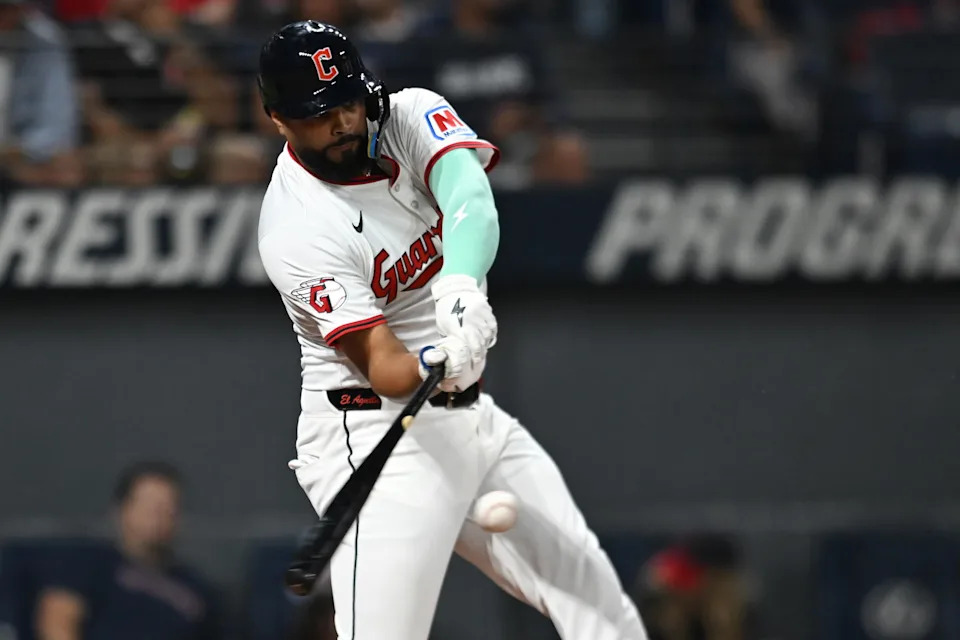 Sep 27, 2025; Cleveland, Ohio, USA; Cleveland Guardians right fielder Johnathan Rodriguez (30) hits a home run against the Texas Rangers during the first inning at Progressive Field. Mandatory Credit: Ken Blaze-Imagn Images