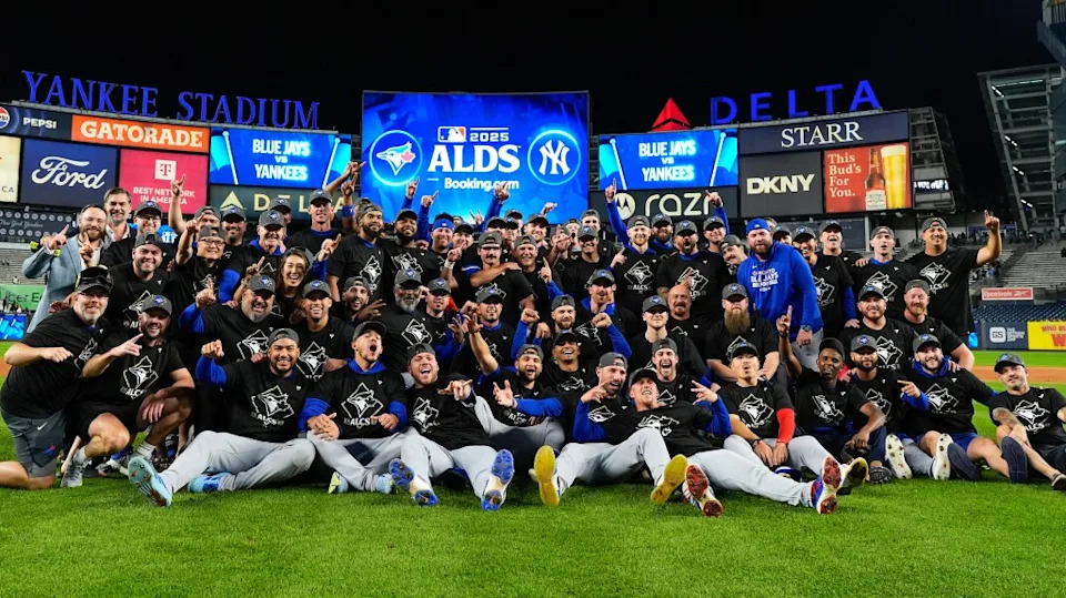 The Blue Jays celebrate beating the Yankees in the ALDS. AP