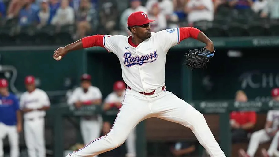 Texas Rangers starting pitcher Kumar Rocker delivers a pitch.