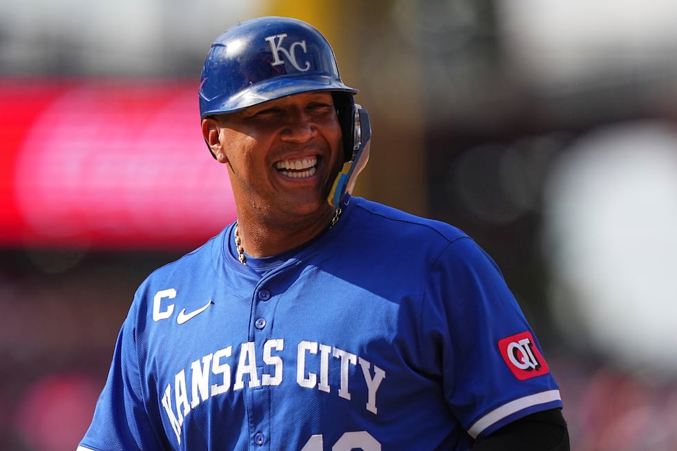 FILE - Kansas City Royals' Salvador Perez smiles after hitting an RBI single off Philadelphia...