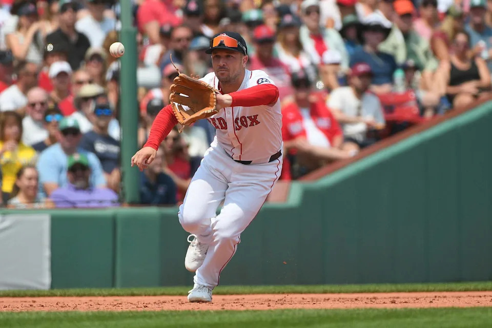 Aug 3, 2025; Boston, Massachusetts, USA; Boston Red Sox third baseman Alex Bregman (2) fields the ball during the sixth inning against the Houston Astros at Fenway Park. (Bob DeChiara/Imagn Images)